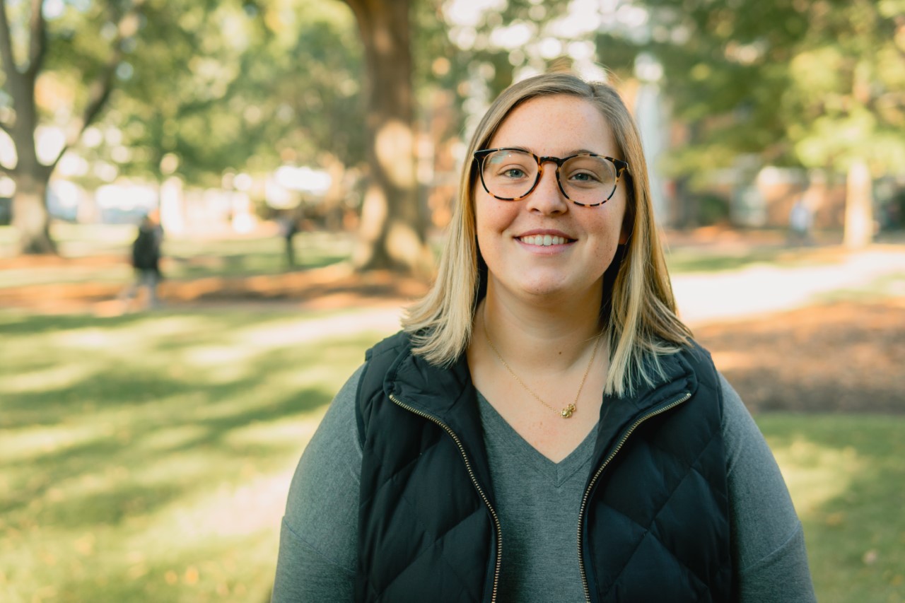 Sarah Pritchard smiles with the University of South Carolina's scenic Horseshoe in the background